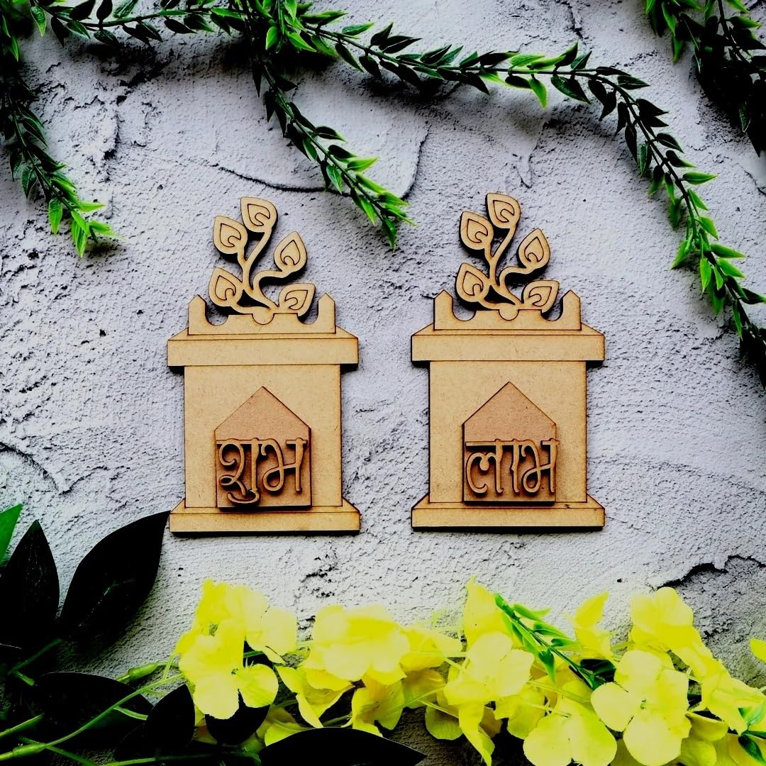 Two wooden decorative items with script on a textured surface with greenery and flowers.
