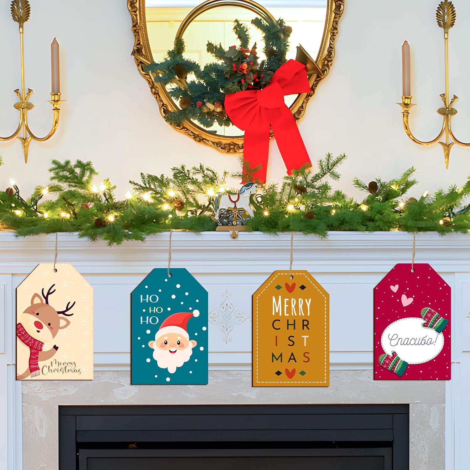 Decorative Christmas mantel with festive signs and a wreath.