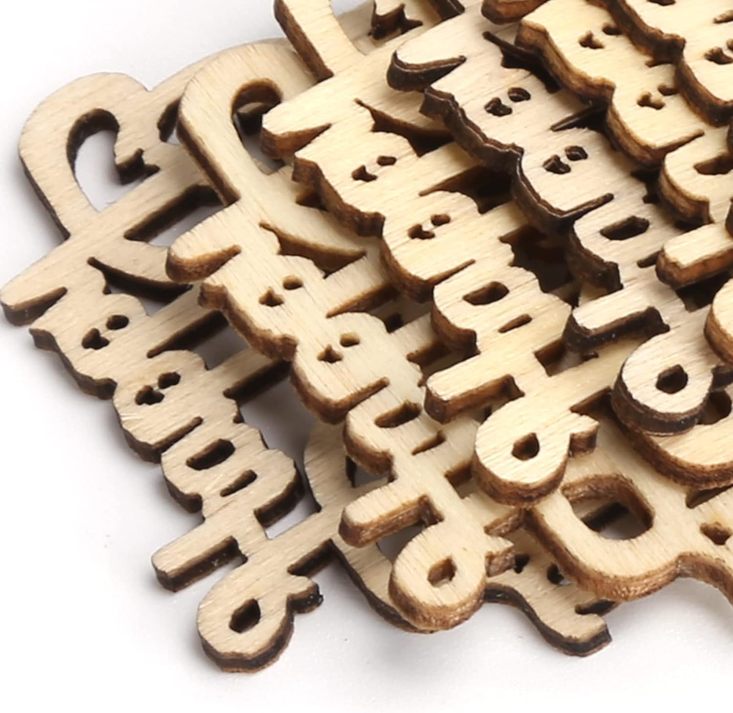 Wooden letter-shaped cutouts on a white background
