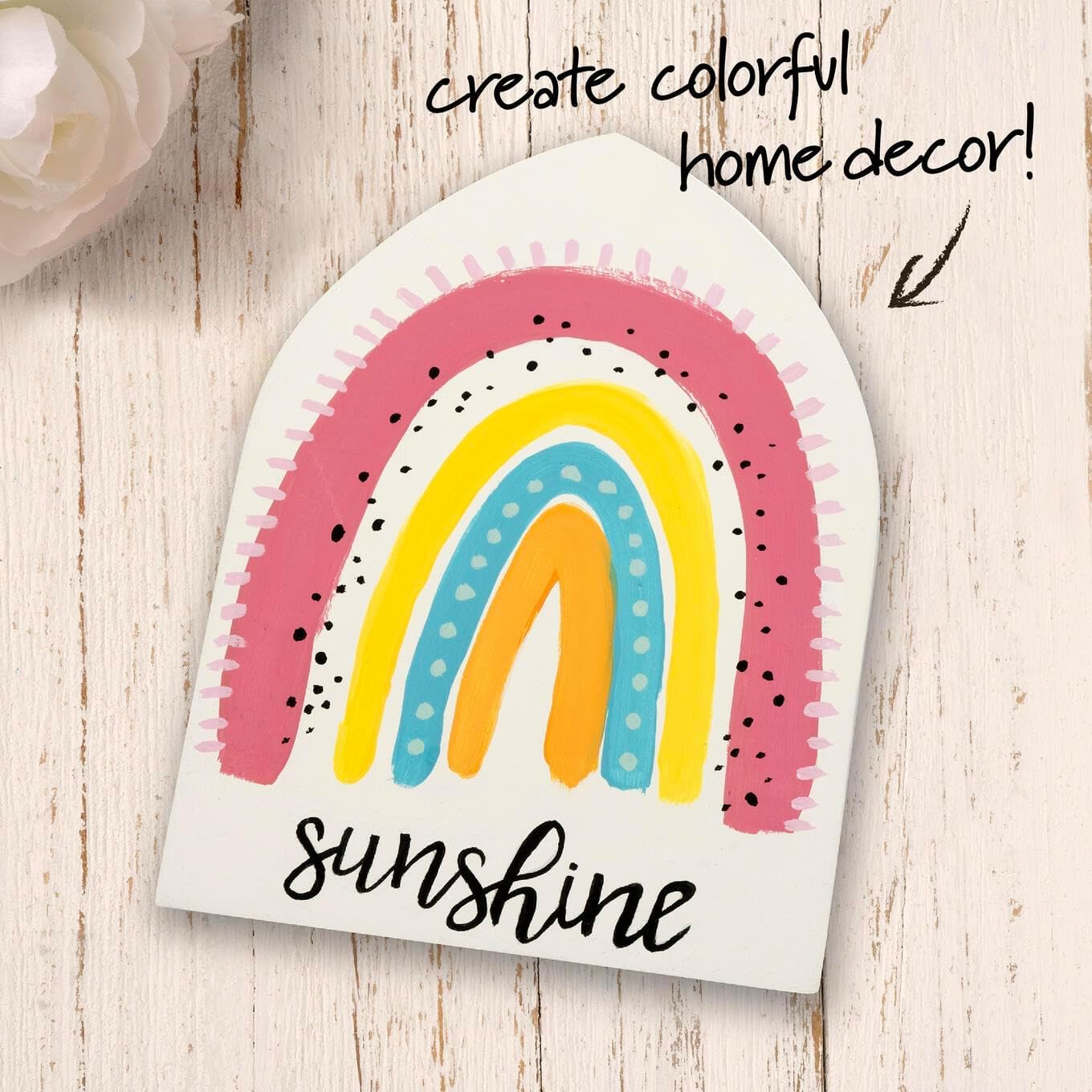 Colorful rainbow design with the word 'sunshine' on a wooden surface, labeled for home decor.