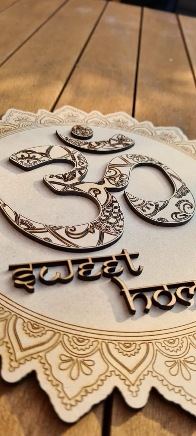 Decorative wooden sign with 'Om' symbol and '30 sweet hols' text on a wooden surface