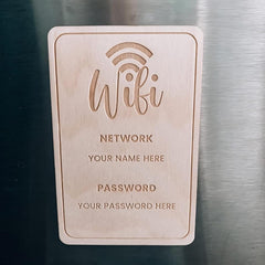 Wooden WiFi network sign with customizable text on a metallic surface
