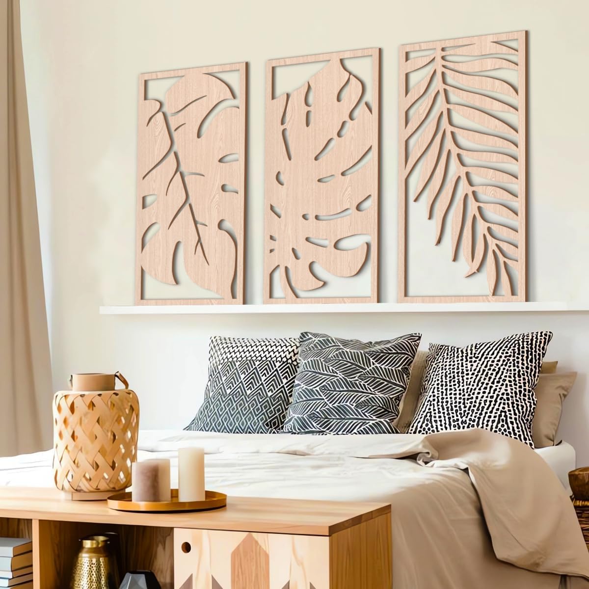 Decorative wall panels with leaf patterns above a sofa with patterned cushions.