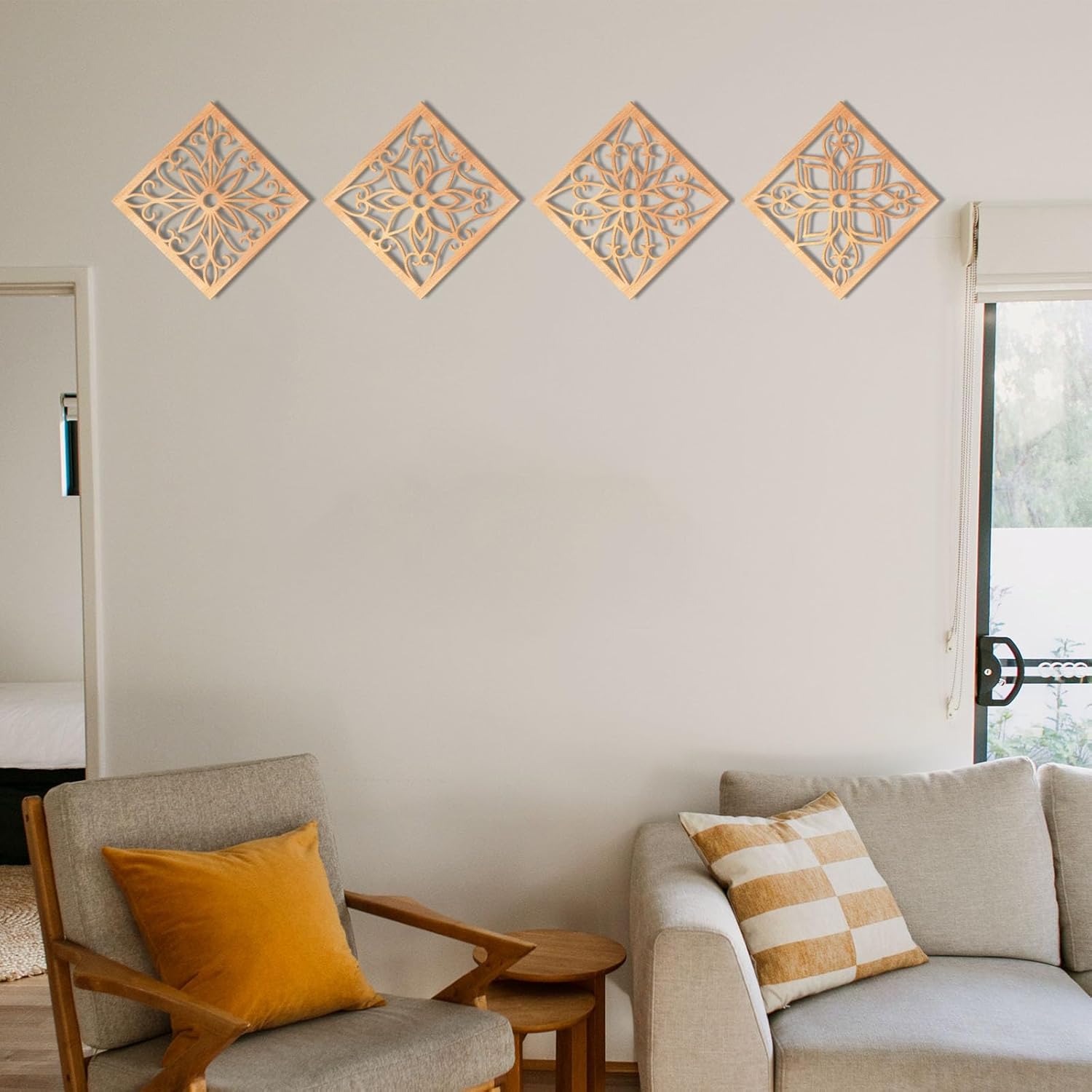 Decorative wall panels above a living room with a sofa and armchair.