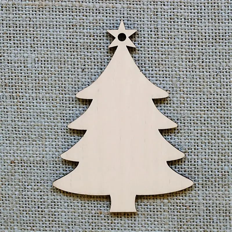 Wooden Christmas tree decoration with a star on a textured fabric background