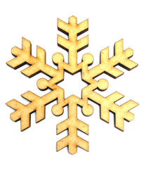 Gold snowflake ornament on a white background
