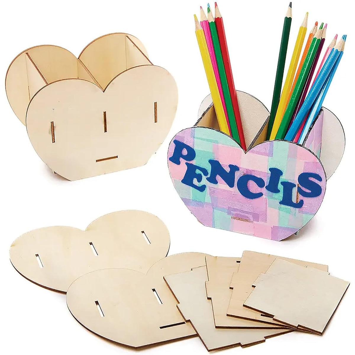 Heart-shaped wooden pencil holder with colorful pencils and additional wooden pieces on a white background