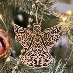 Decorative angel ornament on a Christmas tree