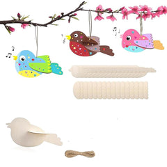 Colorful bird-shaped wooden toys hanging from a branch with pink flowers.