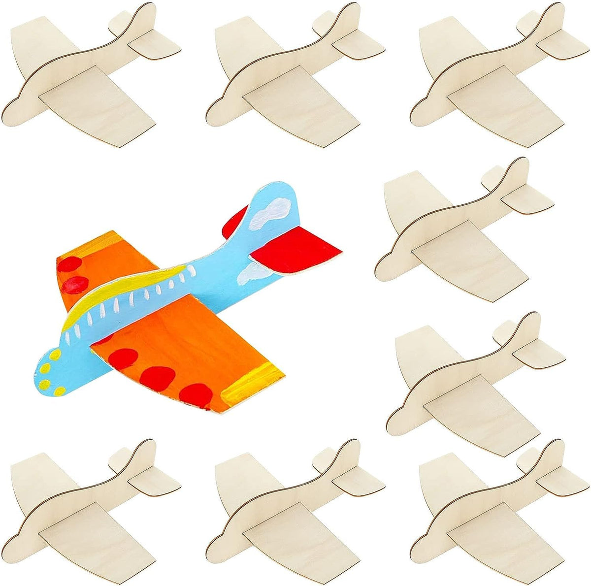 Colorful toy airplane with beige cut-out airplane shapes on a white background