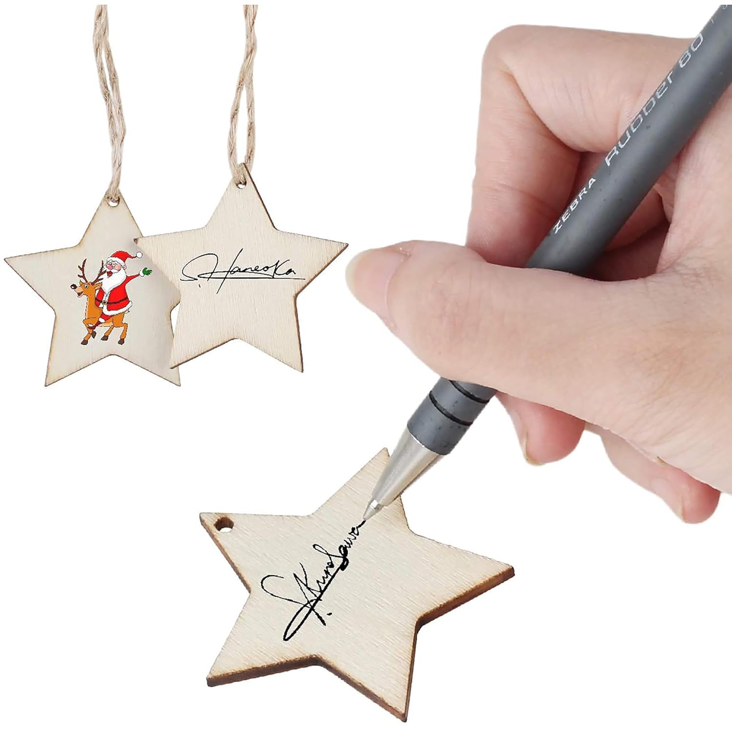 Hand writing on a wooden star ornament with a marker, next to another star ornament with a printed design.