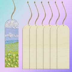 Set of six cardboard tags with printed scenic designs on a pastel gradient background