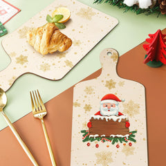 Decorative cutting board with Santa Claus design on a festive table setting.