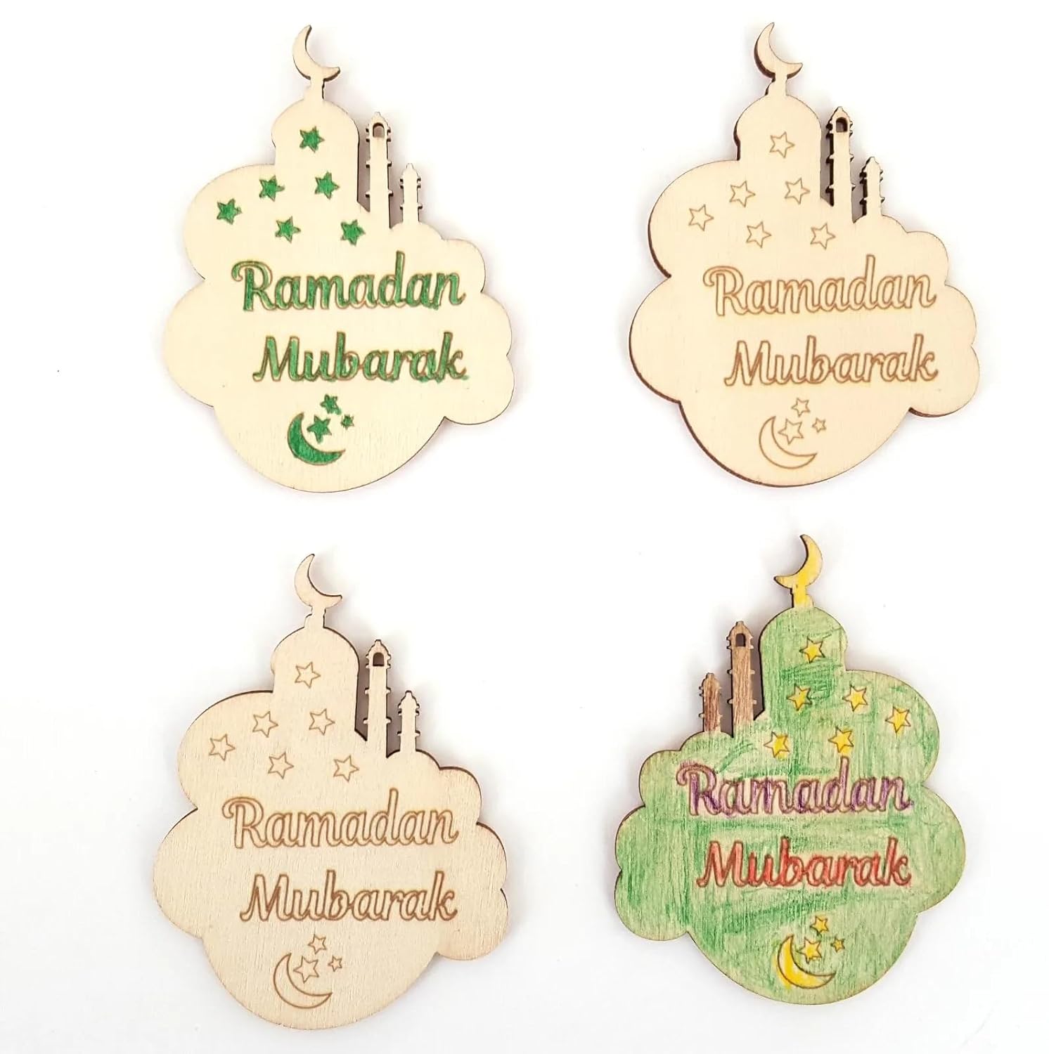 Four 'Ramadan Mubarak' decorative items on a white background