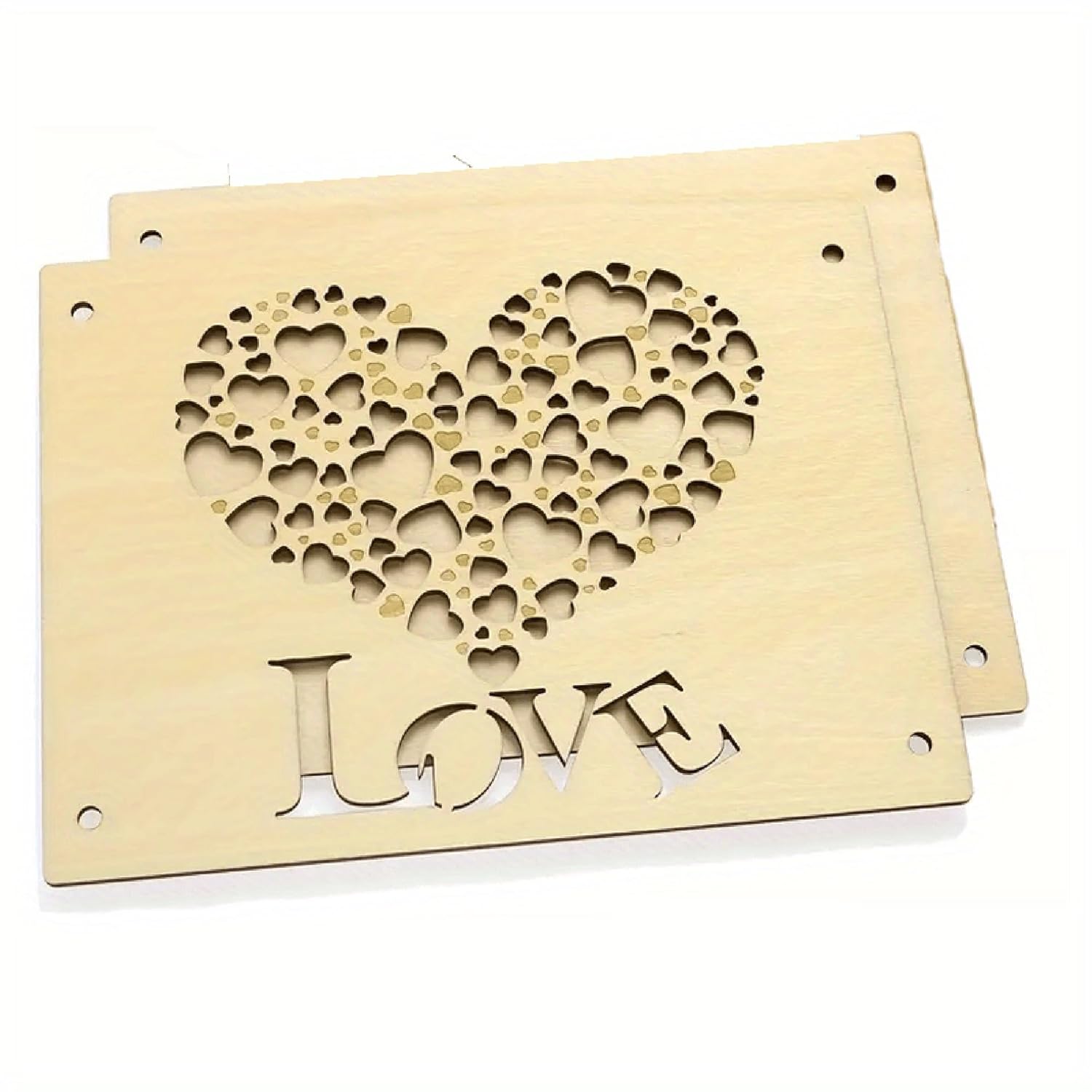 Wooden stencil with heart design and 'LOVE' text on a white background
