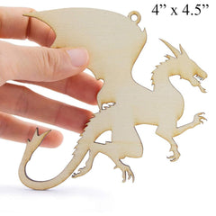 Wooden dragon ornament held by a hand with dimensions displayed.