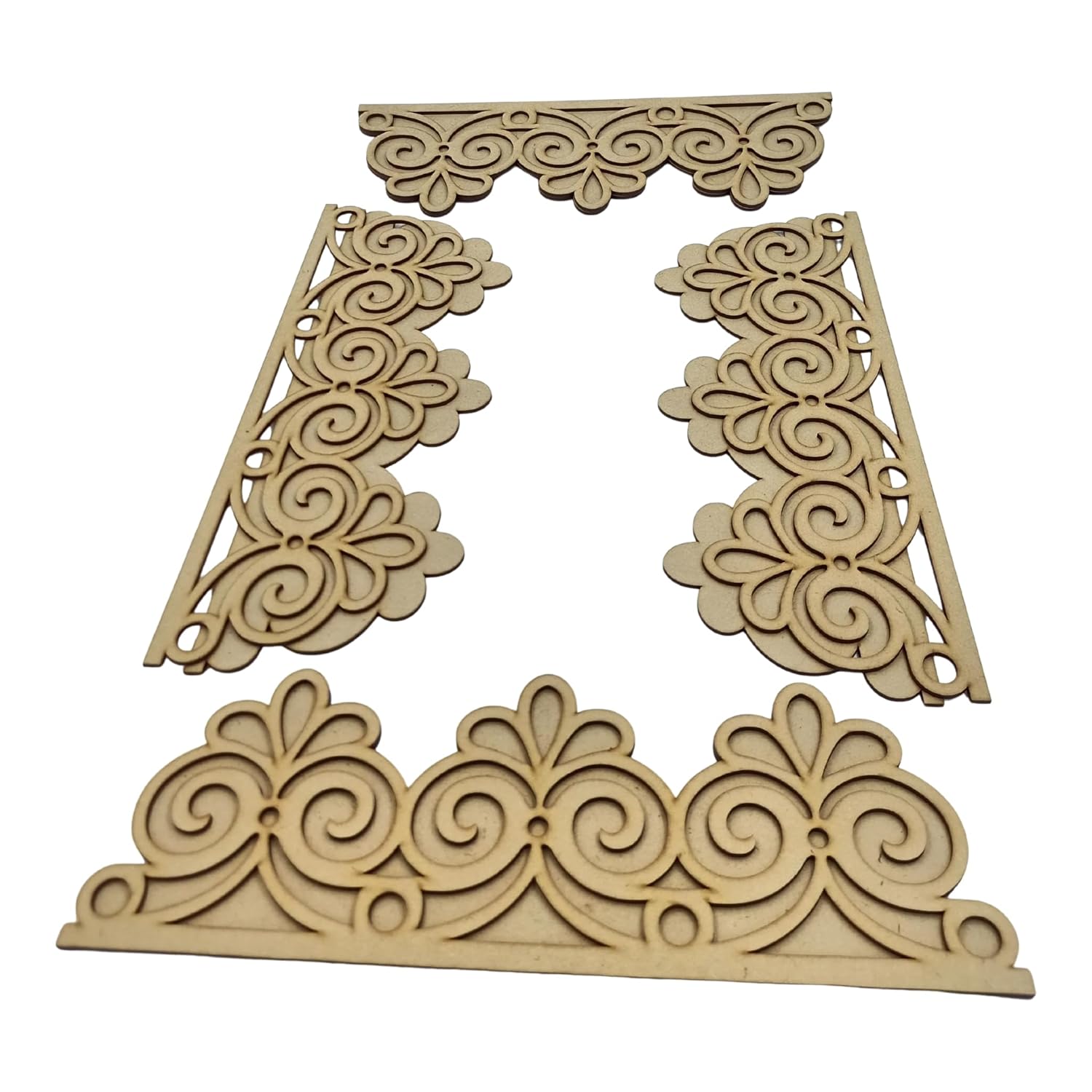 Decorative wooden pieces with intricate cut-out patterns on a white background
