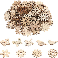 Assorted wooden cutouts including flowers and birds on a white background
