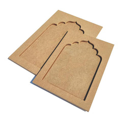 Two brown cardboard boxes with decorative cutout designs on a white background