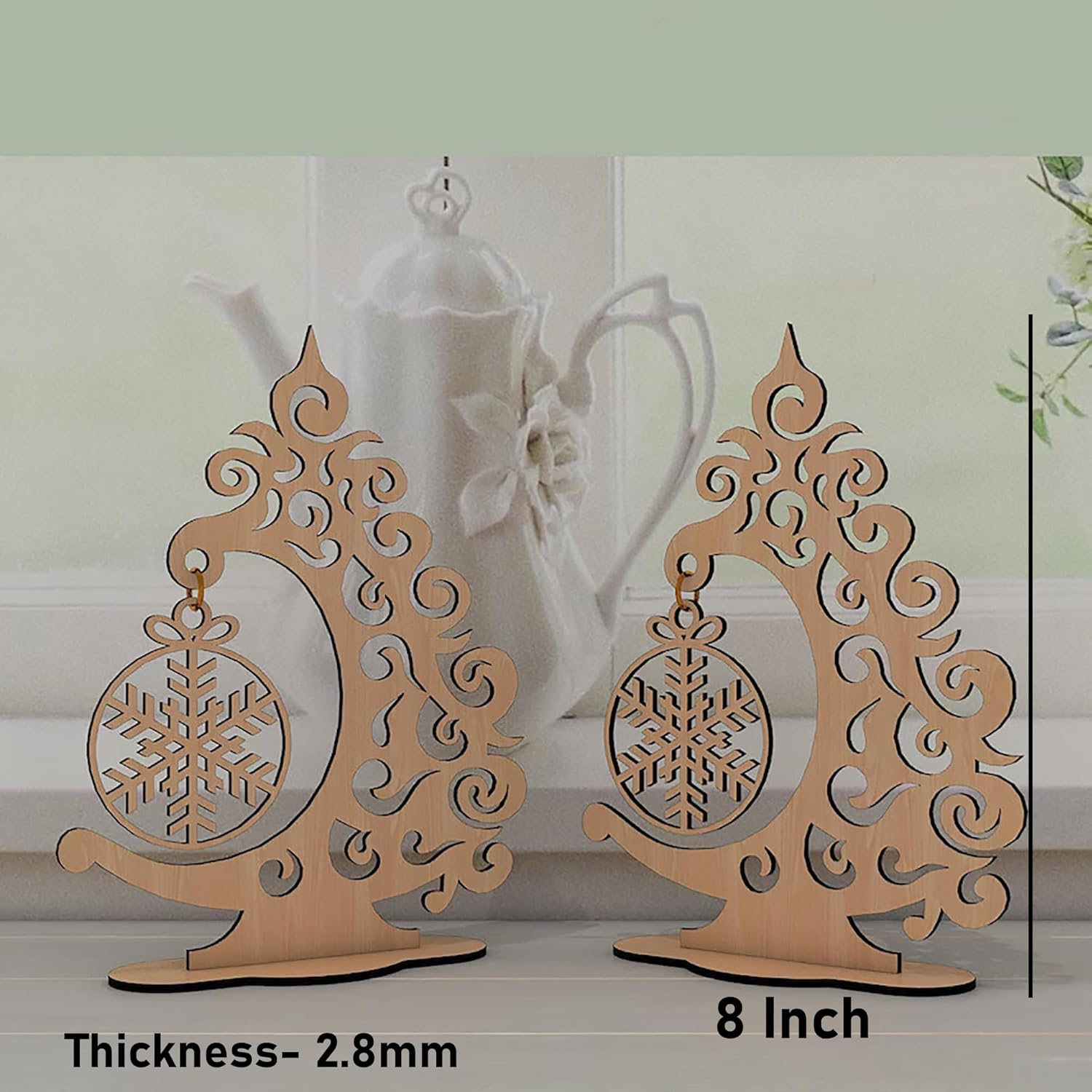 Two decorative wooden stands with intricate designs on a light background