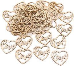 Wooden heart-shaped cutouts with 'love' engraving on a white background