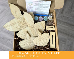 DIWALI DIYA Paint Kit with wooden leaves and paint supplies on a gray surface