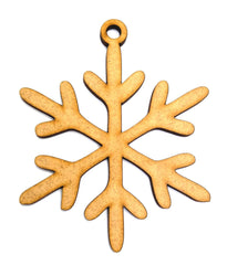 Wooden snowflake ornament on a white background