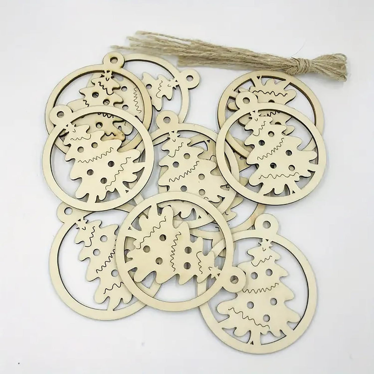 Wooden Christmas ornaments with geometric cutouts on a white background