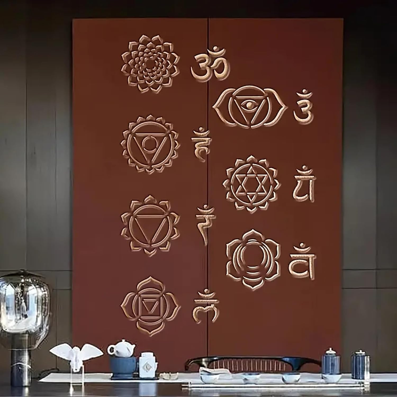 Decorative wall with embossed symbols on a brown background