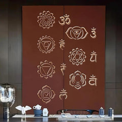 Decorative wall with embossed symbols on a brown background