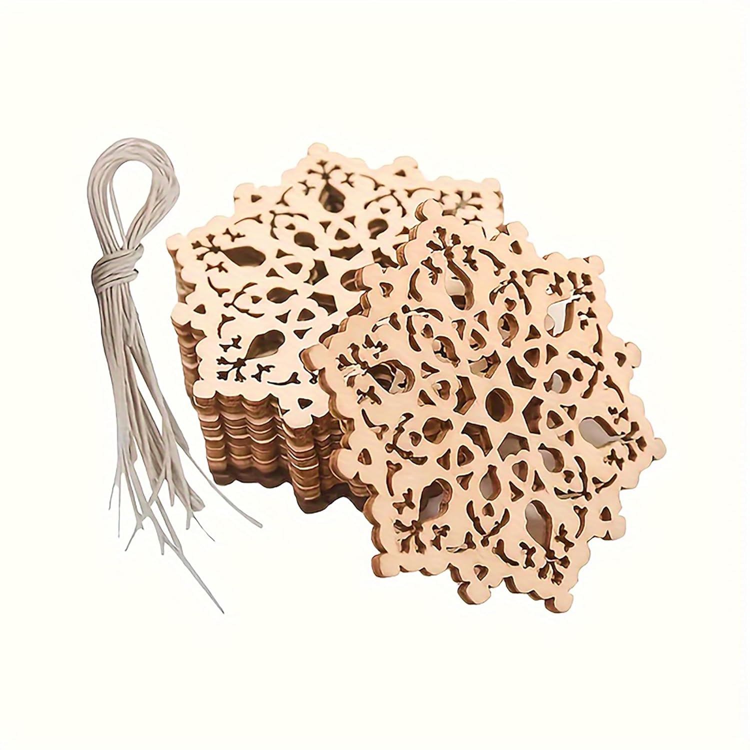 Set of wooden coasters with intricate cut-out designs on a white background