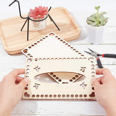 Wooden puzzle with butterfly design held by hands on a wooden surface with plants and tools.