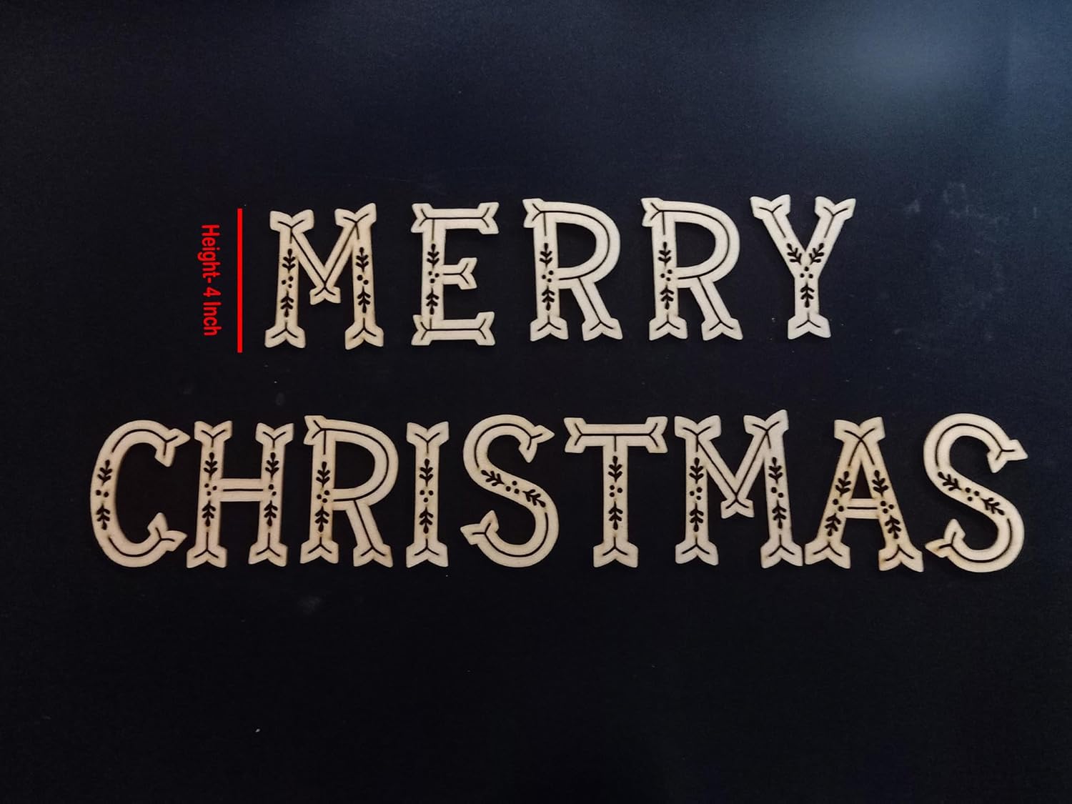 Decorative 'Merry Christmas' text on a black background