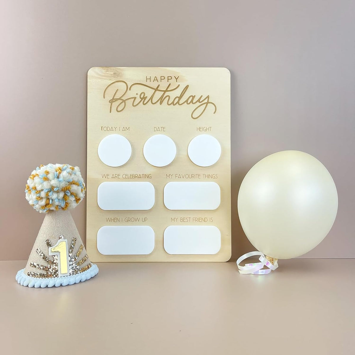 Personalized birthday card with a party hat and balloon on a neutral background