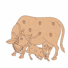 Decorative cutout of a bull and calf with intricate patterns on a white background