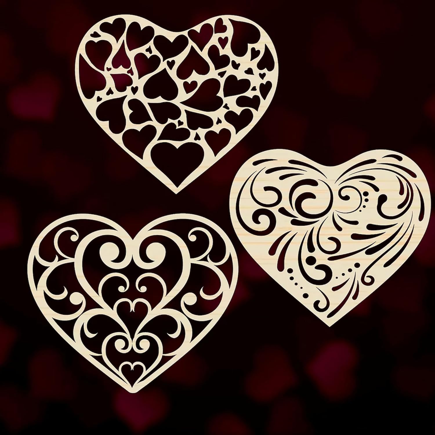 Three ornate heart shapes on a dark background
