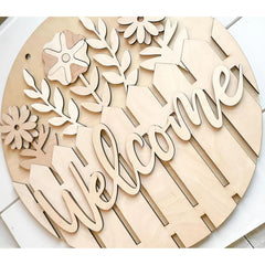 Wooden decorative sign with 'Welcome' and floral designs on a white background