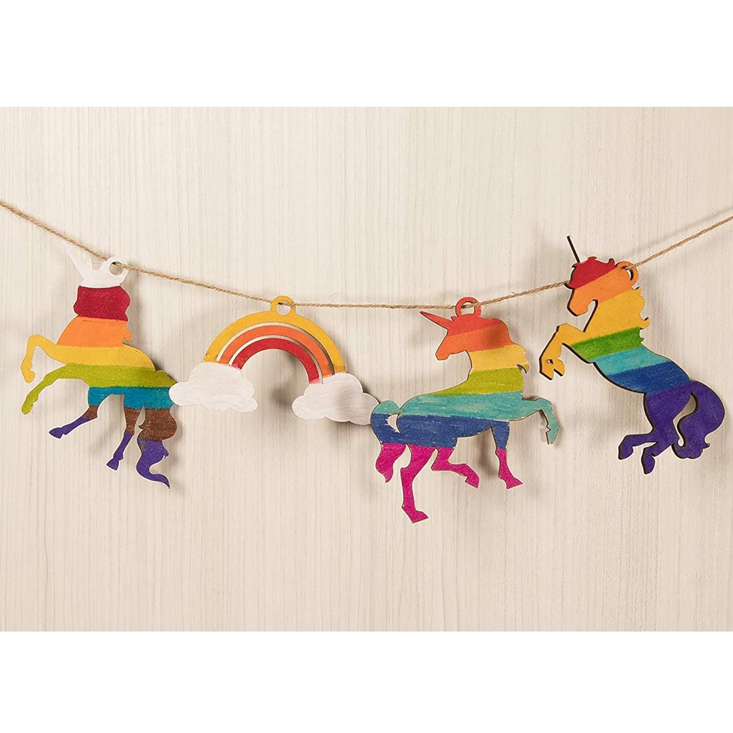Colorful unicorn and rainbow banner on a beige background