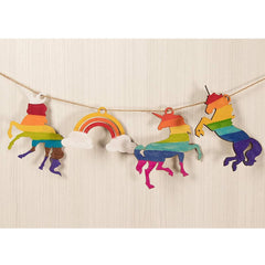 Colorful unicorn and rainbow banner on a beige background
