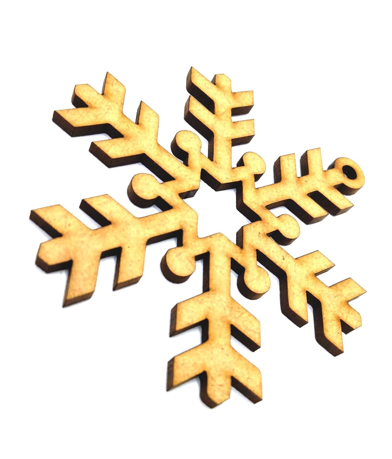 Wooden snowflake ornament on a white background