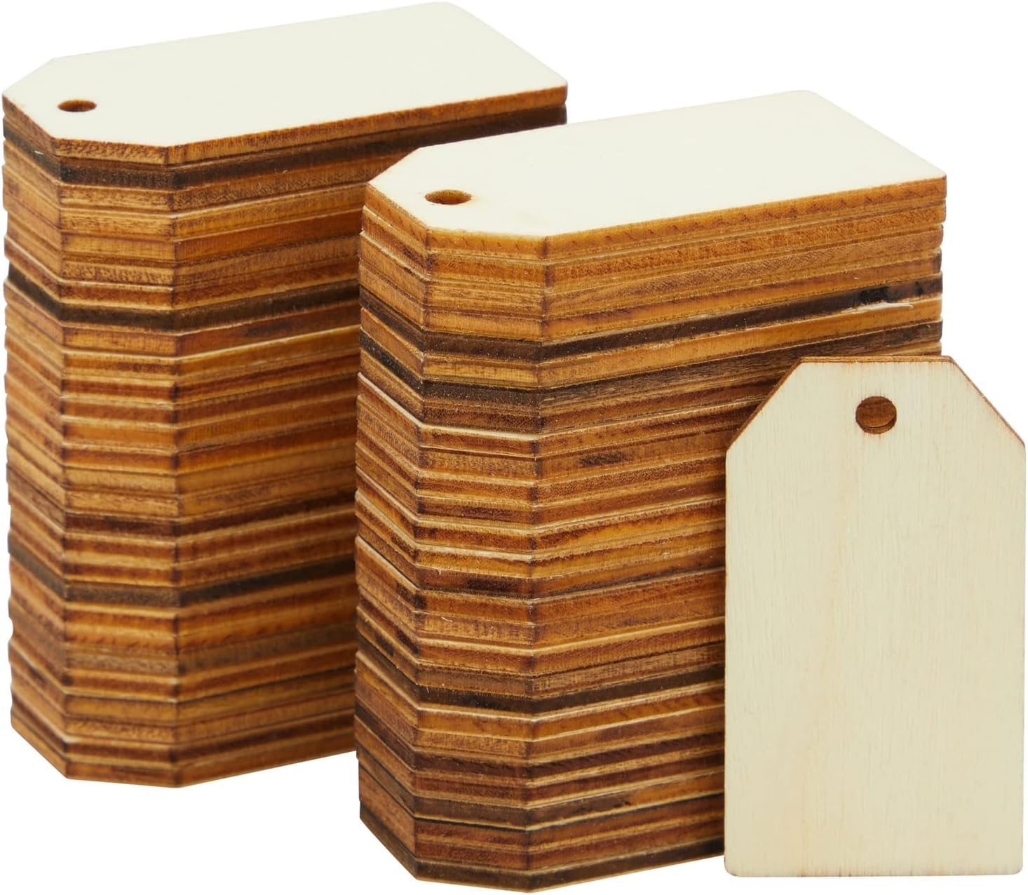 Stacks of wooden tags with a plain background