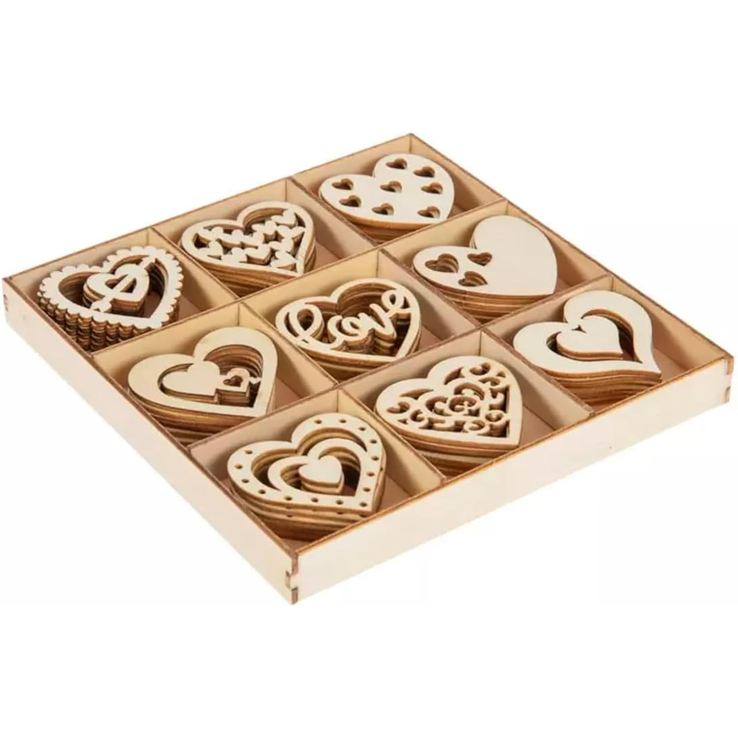 Set of wooden heart-shaped decorations in a box on a white background
