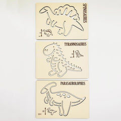 Three dinosaur stencils on a beige background