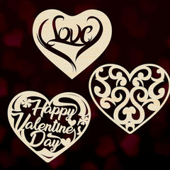 Three wooden heart-shaped cutouts with 'Love', 'Happy Valentine's Day', and decorative patterns on a dark background.