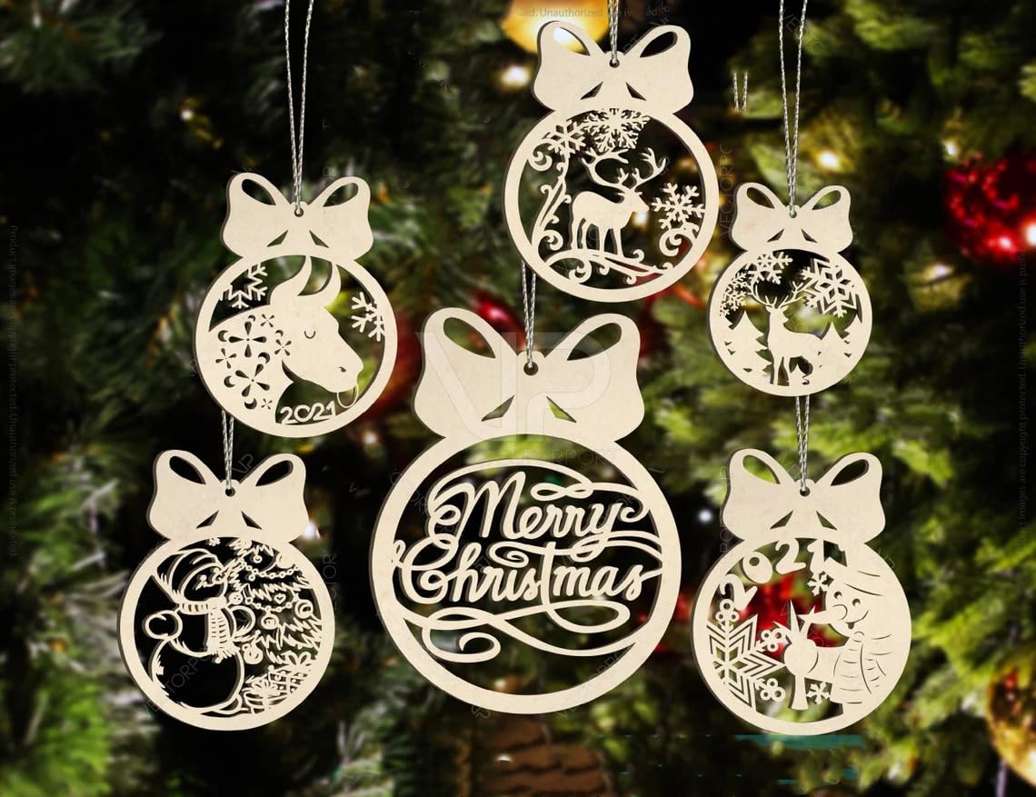 Decorative Christmas ornaments with reindeer and 'Merry Christmas' text on a tree.