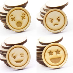Wooden emoji buttons with different facial expressions on a white background