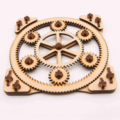 Wooden gear mechanism on a white background