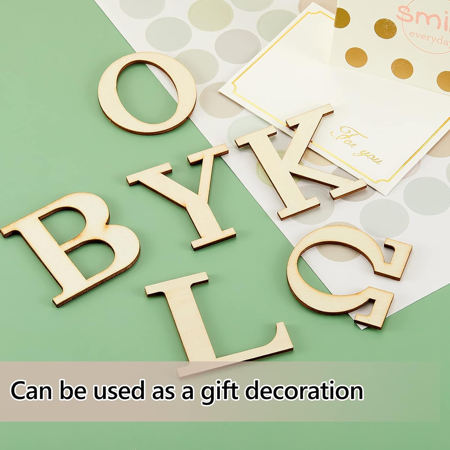 Wooden letters on a green and white background with text 'Can be used as a gift decoration'.