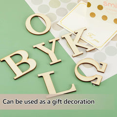 Wooden letters on a green and white background with text 'Can be used as a gift decoration'.