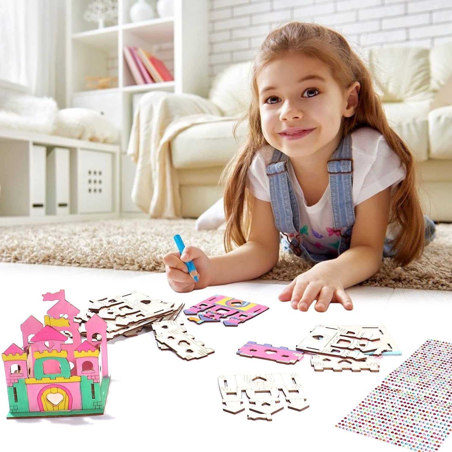 Child playing with wooden castle building blocks on a carpeted floor.